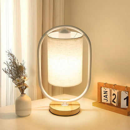 Contemporary Scandinavian Oval Cylinder Solid Wood Metal Fabric 1-Light Table Lamp For Bedroom