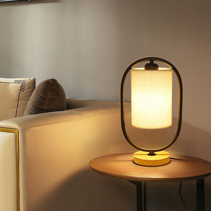 Contemporary Scandinavian Oval Cylinder Solid Wood Metal Fabric 1-Light Table Lamp For Bedroom