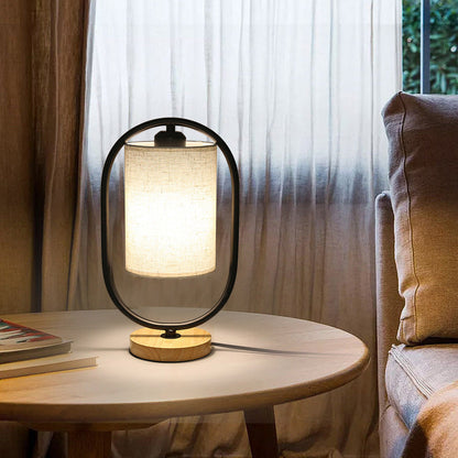 Contemporary Scandinavian Oval Cylinder Solid Wood Metal Fabric 1-Light Table Lamp For Bedroom
