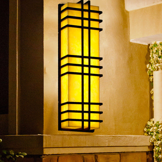 Architectural Wall Sconce in Prairie Style – Amber Frosted Glass & Black Grid Design