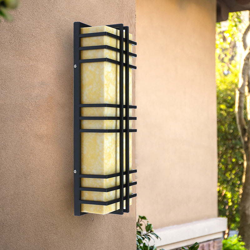 Architectural Wall Sconce in Prairie Style – Amber Frosted Glass & Black Grid Design