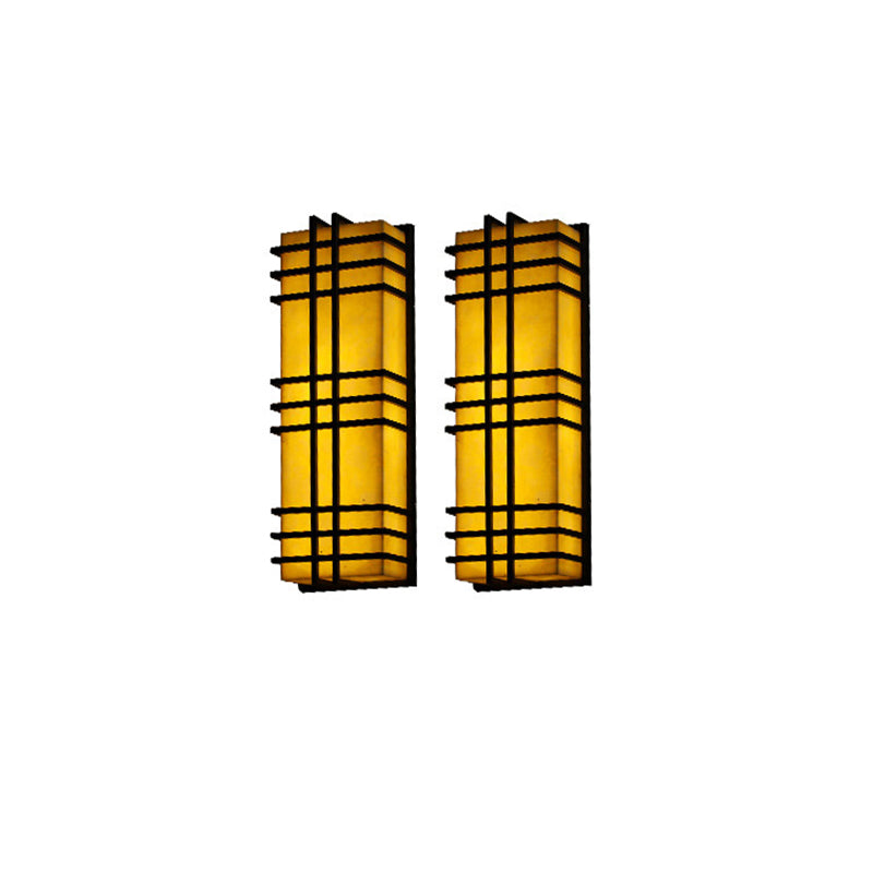 Architectural Wall Sconce in Prairie Style – Amber Frosted Glass & Black Grid Design