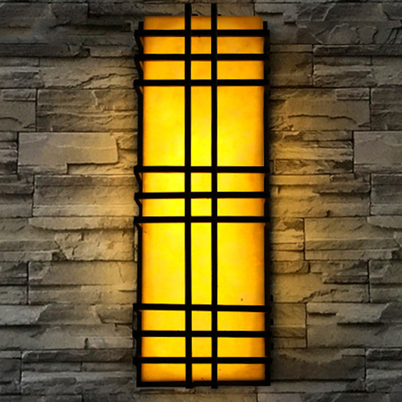 Architectural Wall Sconce in Prairie Style – Amber Frosted Glass & Black Grid Design