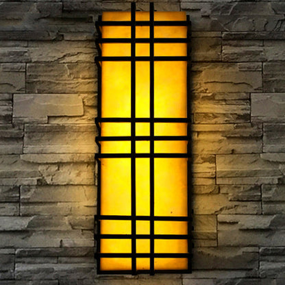 Architectural Wall Sconce in Prairie Style – Amber Frosted Glass & Black Grid Design