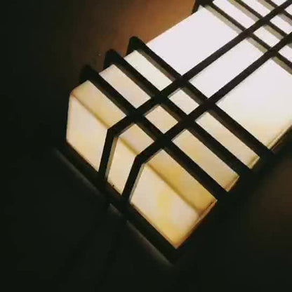 Architectural Wall Sconce in Prairie Style – Amber Frosted Glass & Black Grid Design