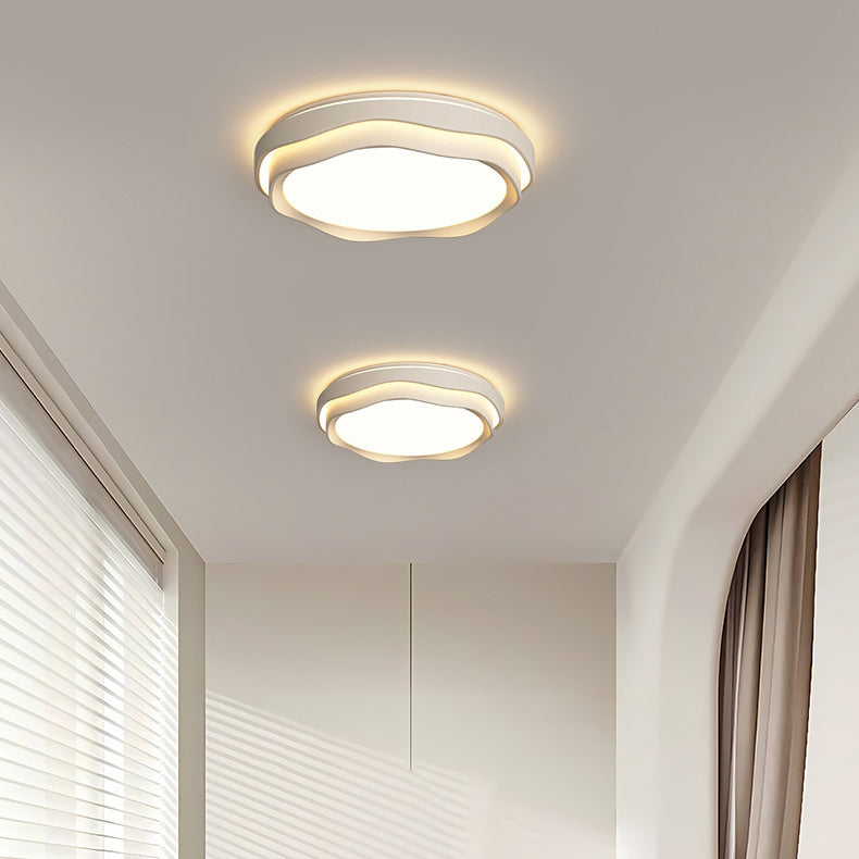 Modern Minimalist Cream-Toned Round Iron PE LED Flush Mount Ceiling Light For Bedroom