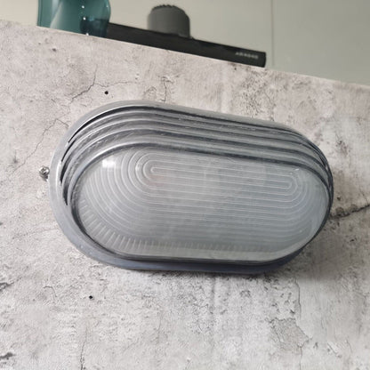 Contemporary Industrial Waterproof Aluminum Glass Frosted Oval Striped 1-Light Wall Sconce Lamp For Outdoor Patio