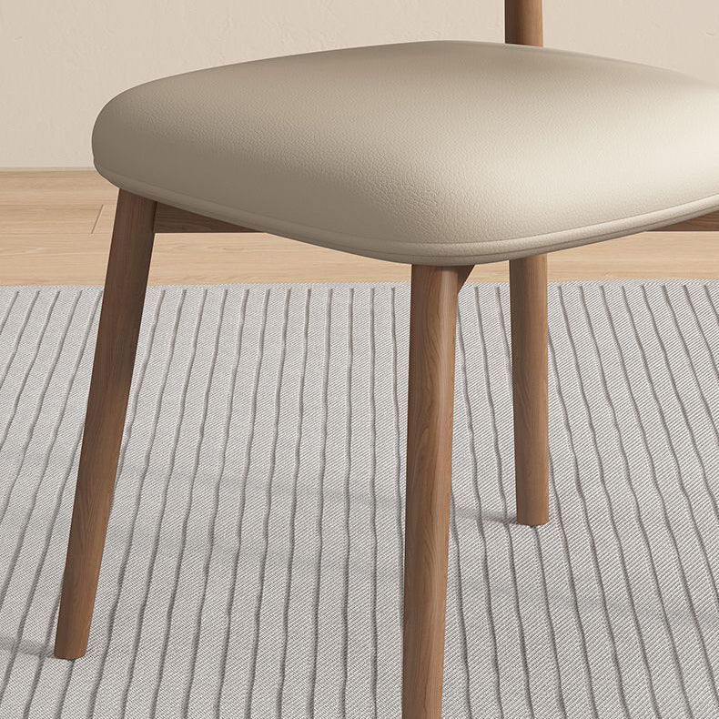 Contemporary Scandinavian PU Leather Solid Wood Dining Chair Backrest Armless For Dining Room