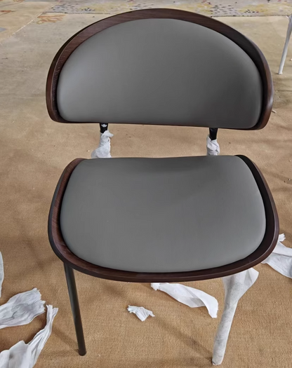 Contemporary Scandinavian Arc Faux Leather Solid Wood Carbon Steel Dining Chair Backrest Armless For Dining Room