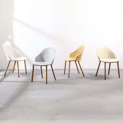 Contemporary Scandinavian Sleek Backrest Plastic Dining Chair With Solid Wood Legs For Dining Room