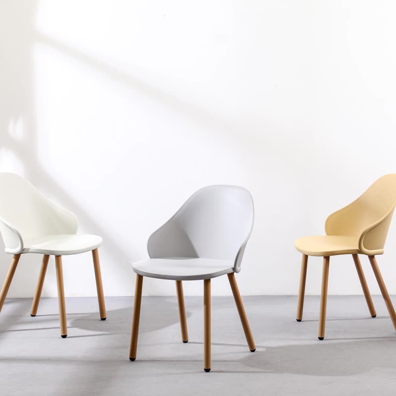 Contemporary Scandinavian Sleek Backrest Plastic Dining Chair With Solid Wood Legs For Dining Room