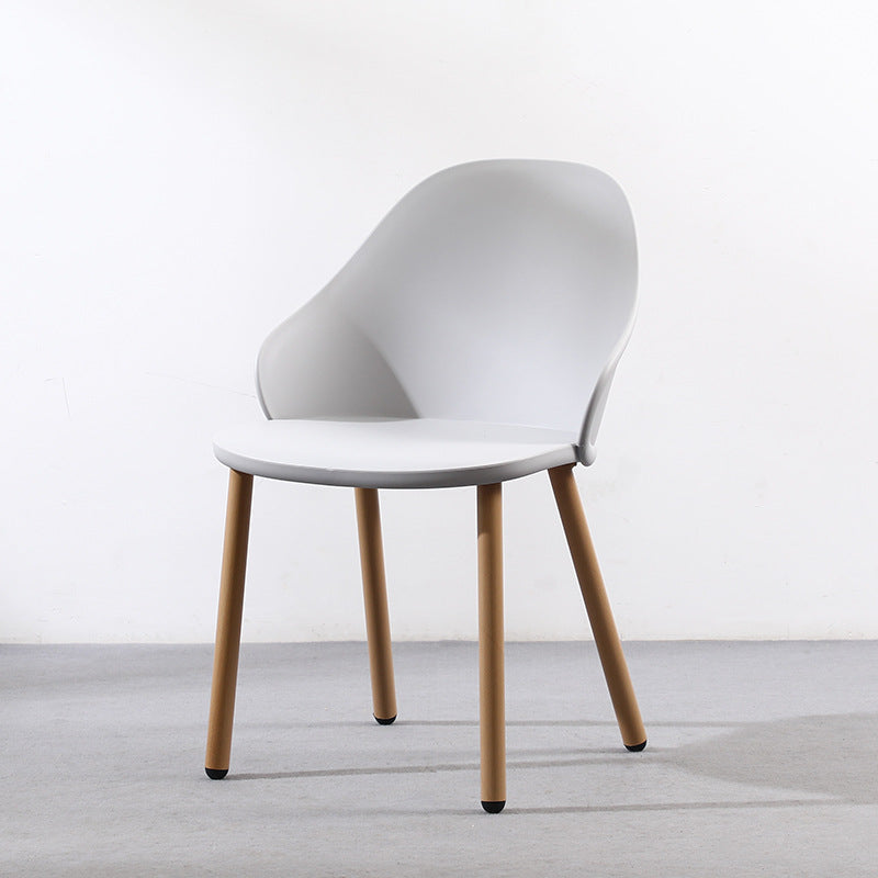 Contemporary Scandinavian Sleek Backrest Plastic Dining Chair With Solid Wood Legs For Dining Room