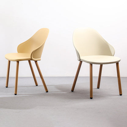 Contemporary Scandinavian Sleek Backrest Plastic Dining Chair With Solid Wood Legs For Dining Room