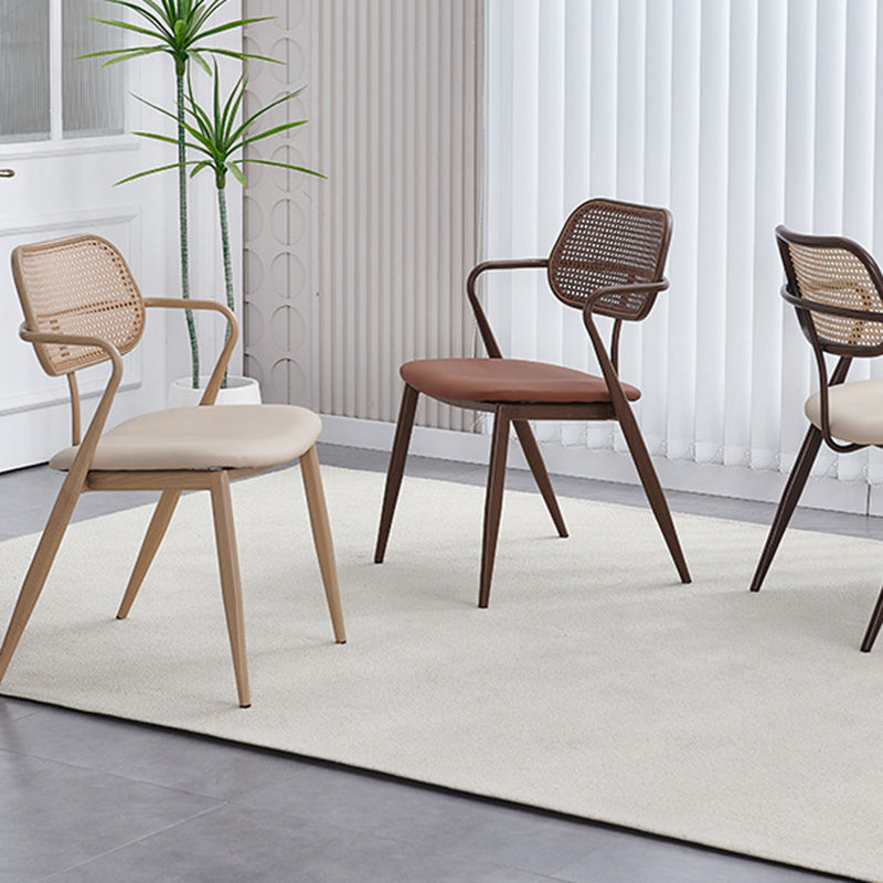 Contemporary Nordic Oval Iron Faux Leather Sponge Plastic Rattan Weaving Dining Chair Backrest Armrest For Dining Room