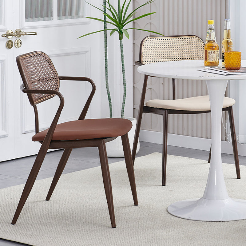 Contemporary Nordic Oval Iron Faux Leather Sponge Plastic Rattan Weaving Dining Chair Backrest Armrest For Dining Room