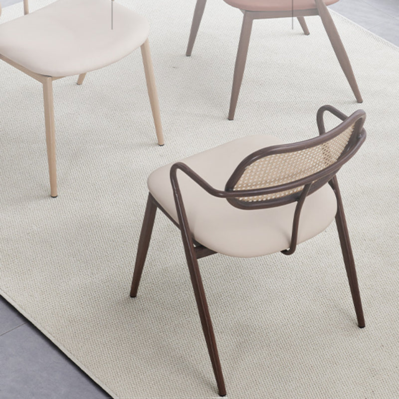 Contemporary Nordic Oval Iron Faux Leather Sponge Plastic Rattan Weaving Dining Chair Backrest Armrest For Dining Room