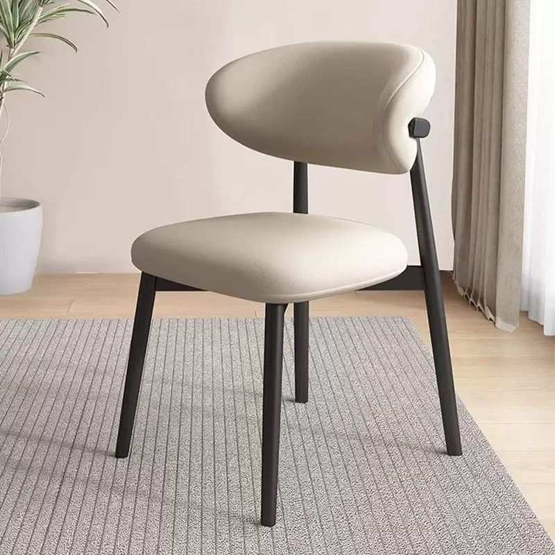 Modern Minimalist Curved PU Leather Carbon Steel Dining Chair Backrest Armless For Dining Room