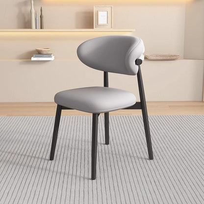 Modern Minimalist Curved PU Leather Carbon Steel Dining Chair Backrest Armless For Dining Room