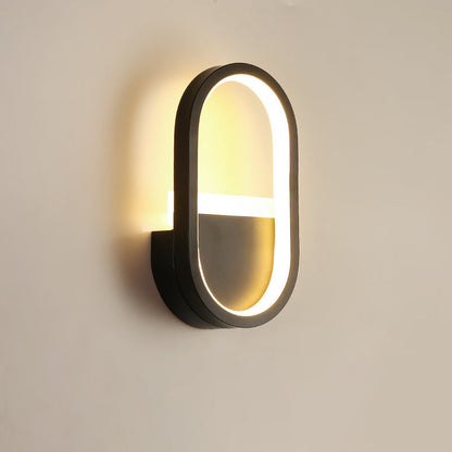 مصباح حائط LED دائري بيضاوي الشكل مصنوع من الحديد والسيليكون بتصميم عصري بسيط لغرفة النوم 