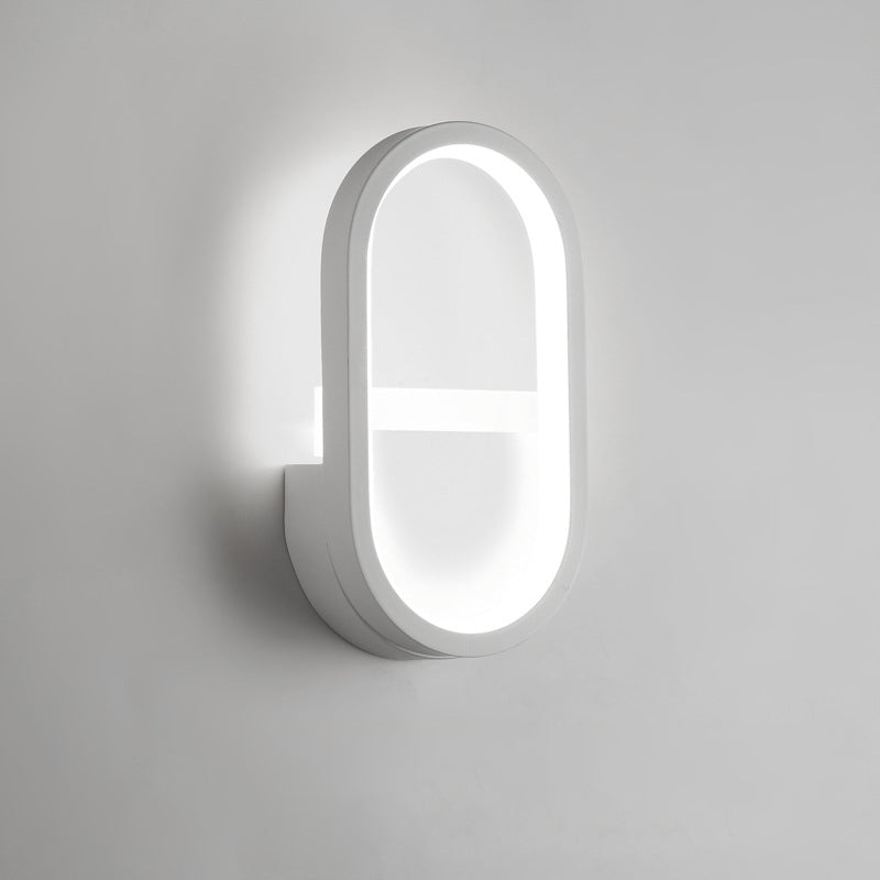 مصباح حائط LED دائري بيضاوي الشكل مصنوع من الحديد والسيليكون بتصميم عصري بسيط لغرفة النوم 
